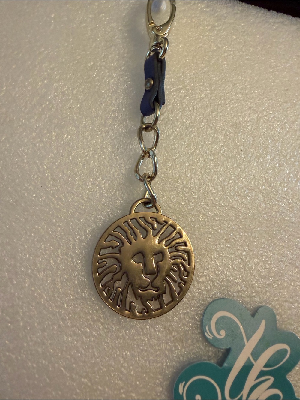 Anne Klein Gold Lion Medallion Keychain with Navy Accent